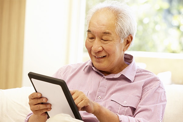 Elderly Man with Tablet