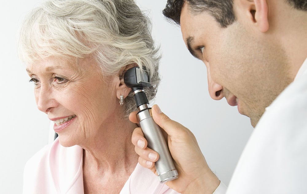 Woman Getting Ear Exam