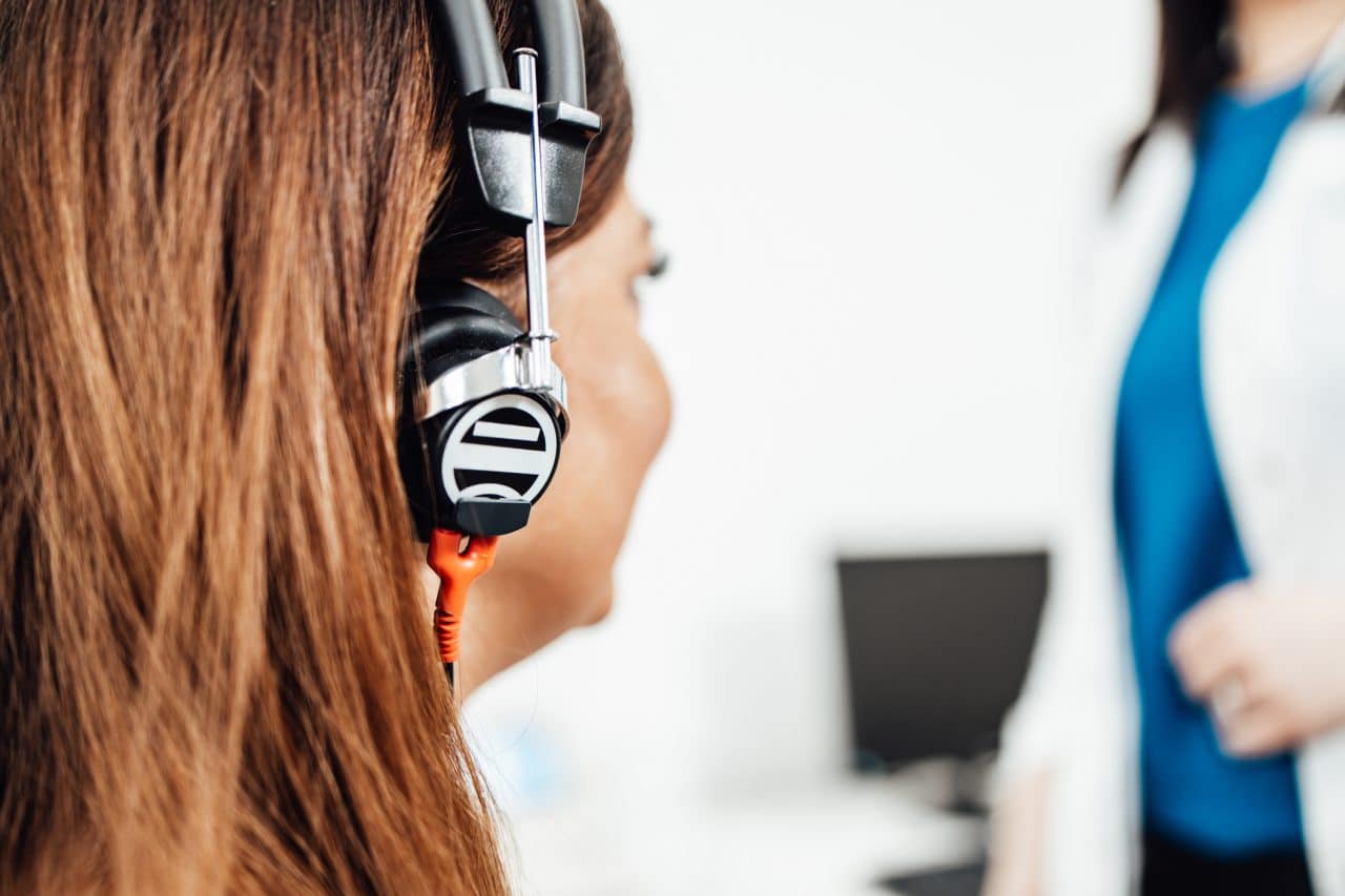 Woman getting a hearing test.