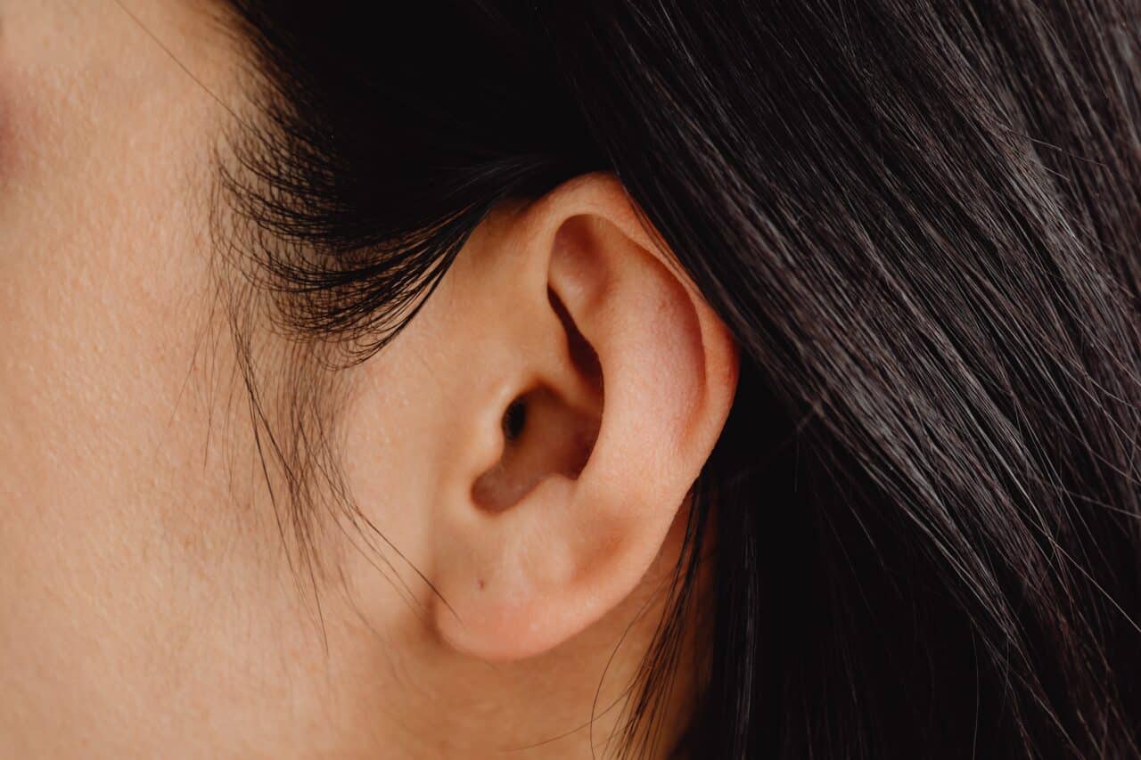 Close up of a woman's ear.