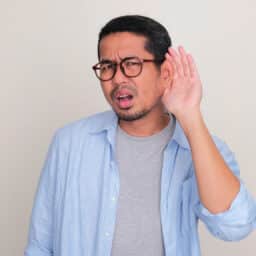 Man wondering what tinnitus sounds like.